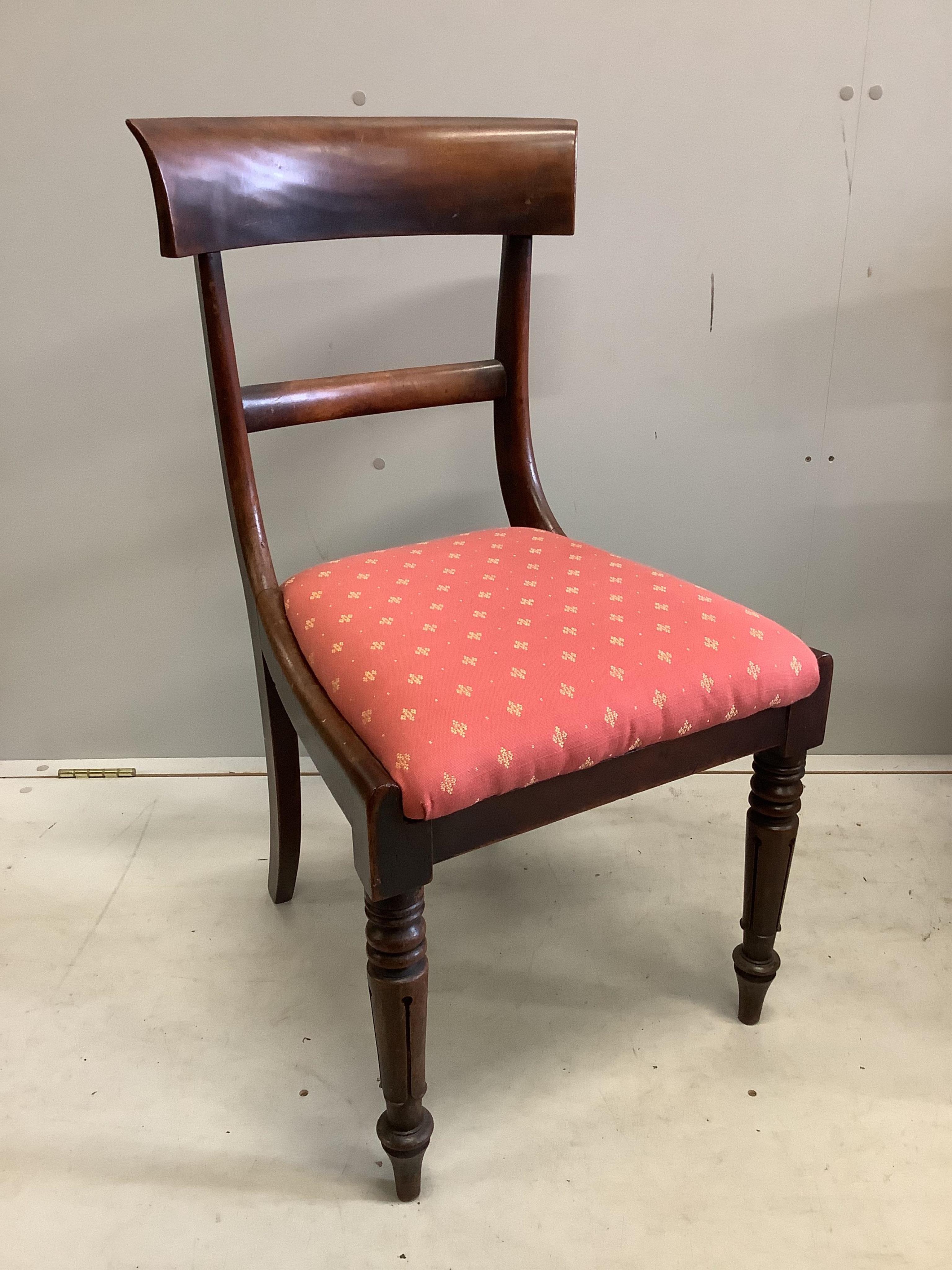 A Victorian circular mahogany tilt top breakfast table, diameter 118cm, height 77cm together with a harlequin set of six William IV mahogany and simulated rosewood dining chairs. Condition - fair